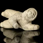 DAVID ARNASUNGAAQ (1964-) QAMANI'TUAQ (BAKER LAKE), Lounging Seal, c. 1990