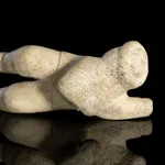 DAVID ARNASUNGAAQ (1964-) QAMANI'TUAQ (BAKER LAKE), Lounging Seal, c. 1990