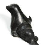 DAVID ARNASUNGAAQ (1964-) QAMANI'TUAQ (BAKER LAKE), Lounging Seal, c. 1990