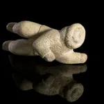 DAVID ARNASUNGAAQ (1964-) QAMANI'TUAQ (BAKER LAKE), Lounging Seal, c. 1990