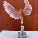 Bronze sculpture of mythical Greek winged figure Icarus by Nicola Godden, displayed on integral plinth