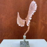 Bronze sculpture of mythical Greek winged figure Icarus by Nicola Godden, displayed on integral plinth