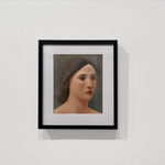 Female head portrait with dark hair and light skin