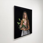 Portrait of a girl holding flowers