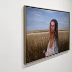 Painting of a girl in a field