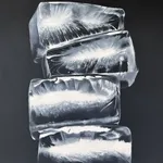 Painting of ice cubes in front of a black background