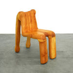 wooden chair shaped like a human