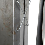 metal sculpture of an exaggerated woman's high heel