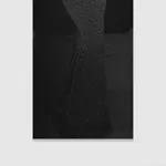 A black and white inkjet print of an abstract scene.