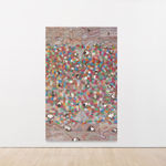 mixed media work featuring reclaimed electronic components on panel featuring an explosive array of swirling and spotted colors