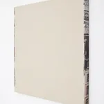 Off white acrylic paint on a canvas.