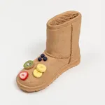 Didi Rojas sculpture of Ugg with fruit on toe