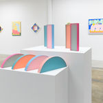 Install image of "Cosmic Bloom" - Rachel Strum's HALO and MONOLITH sculptures.