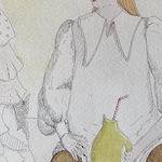 detail image on a woman drinking out of a bottle with a straw