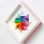 wooden geometric wall sculpture by Sean newport - rainbow