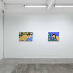 installation of Gina M. Contreras exhibition - two paintings of nude female figures with patterned blankets. From left to right "Every Little Bit Hurts," and "Pensive Pleasure."