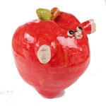 Katie Kimmel's ceramic sculpture of a red apple with a face and arms