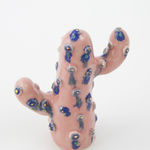 Jen Dwyer sculpture - pink cactus with blue details and one eyball in center