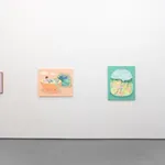 White gallery wall with various paintings by Danym Kwon