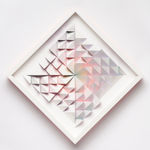 wooden wall sculpture with rainbow colors