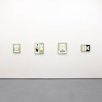 white gallery wall with blue, black, and yellow toned paintings hung evenly in a line