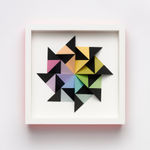 wooden geometric wall sculpture by Sean newport - rainbow