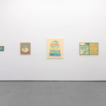 White gallery wall with various paintings by Danym Kwon