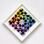 wooden wall sculpture with rainbow colors