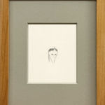 Framed drawing of a girl with a bored look on her face
