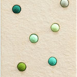 CHIAOZZA - pigmented paper pulp mix media work of six green sphere in different shade mounted in pale peach background.