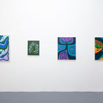 white gallery wall with four colorful paintings by Jocelyn Tsaih