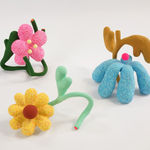 group of colorful flower sculptures