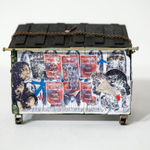 Drew Leshko miniature blue dumpster covered in wheatpaste