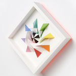 wooden geometric wall sculpture by Sean newport - rainbow