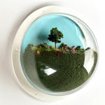 sculpture in glass case