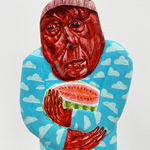 Close of view of the red face side of the sculpture