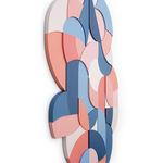 Side view of a free form multicolor wood sculptural piece made up of spiral shapes and curves by artist Scott Albrecht