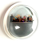 sculpture in glass case