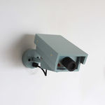 Sculpture of a light blue CCTV camera by Jeff Canham