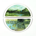 Painting on two halves of a circle of a green mountain landscape