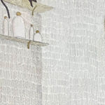 shelves with an animal laying on the top one and shampoo bottles on the lower one