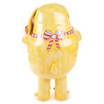 Katie Kimmel's ceramic sculpture of a dog holding fruit in a red checkered apron