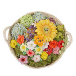 Katie Kimmel's ceramic sculpture of a basket with flowers