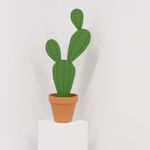 Jeff Canham wooden plant sculpture in a terra cotta pot