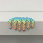 blue, yellow, and orange blob sculpture