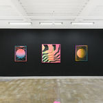 Install image of "Cosmic Bloom." From left to right, "GLEAMINGLOOP," "WAVEFORMPORTAL," "BLACKHOLEGLOW."