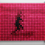 Still image of a rectangular piece with hot pink LEDs behind Plexiglass that displays a heavily pixelated shadowy person running
