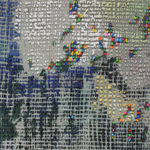 Detail; florescent nubs poke through the canvas.