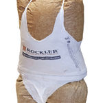 Sculpture of a torso made from a brown paper bag filled with urethane foam. Covering the paper bag is a white shopping bag cut up in a way to mimic a spaghetti strap top and thong underwear. The text on the shopping bag reads Rockler Woodworking and Hardware