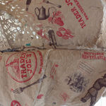 Detail of Odalisque showing paper bag material and paint